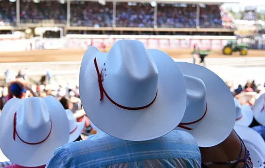 Cowboy hat wearing audience at a Calagary Stampede event