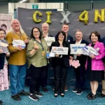 Group of people celebrating the China airlines interline agreement with AirNorth