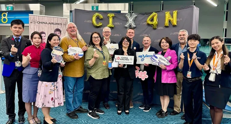 Group of people celebrating the China airlines interline agreement with AirNorth
