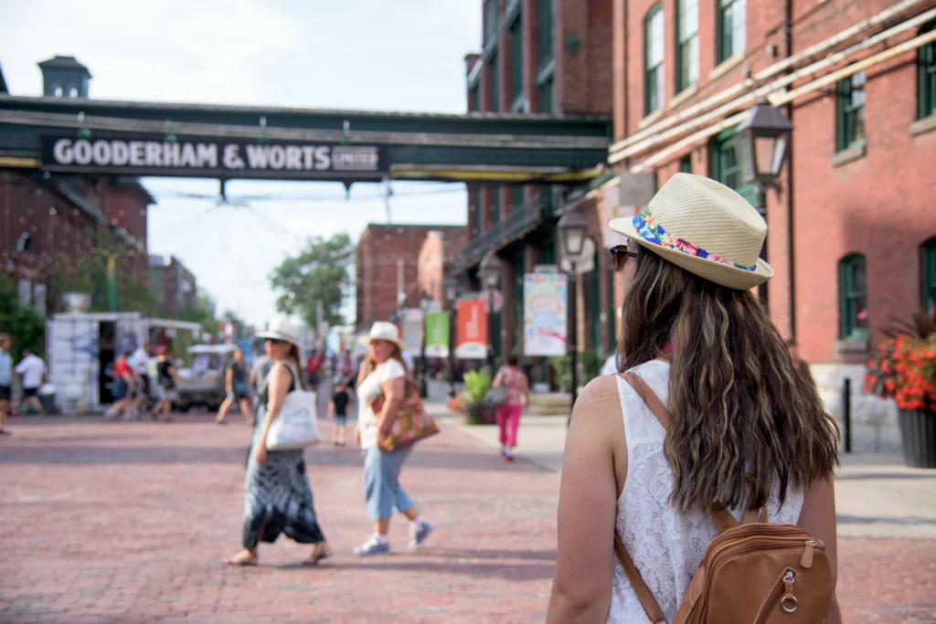 View of Toronto's Distillery District, someone in the foreground