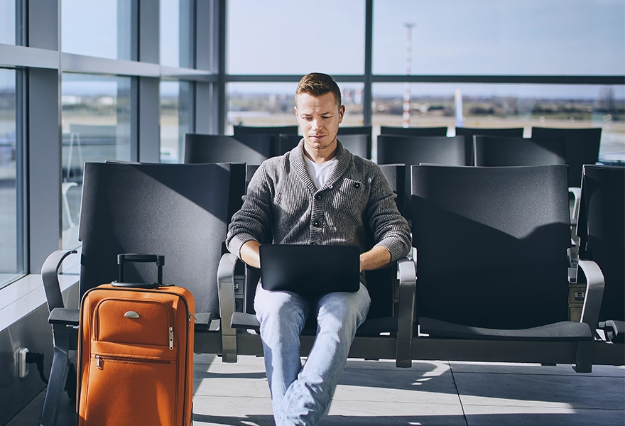 Business traveller waiting at airport