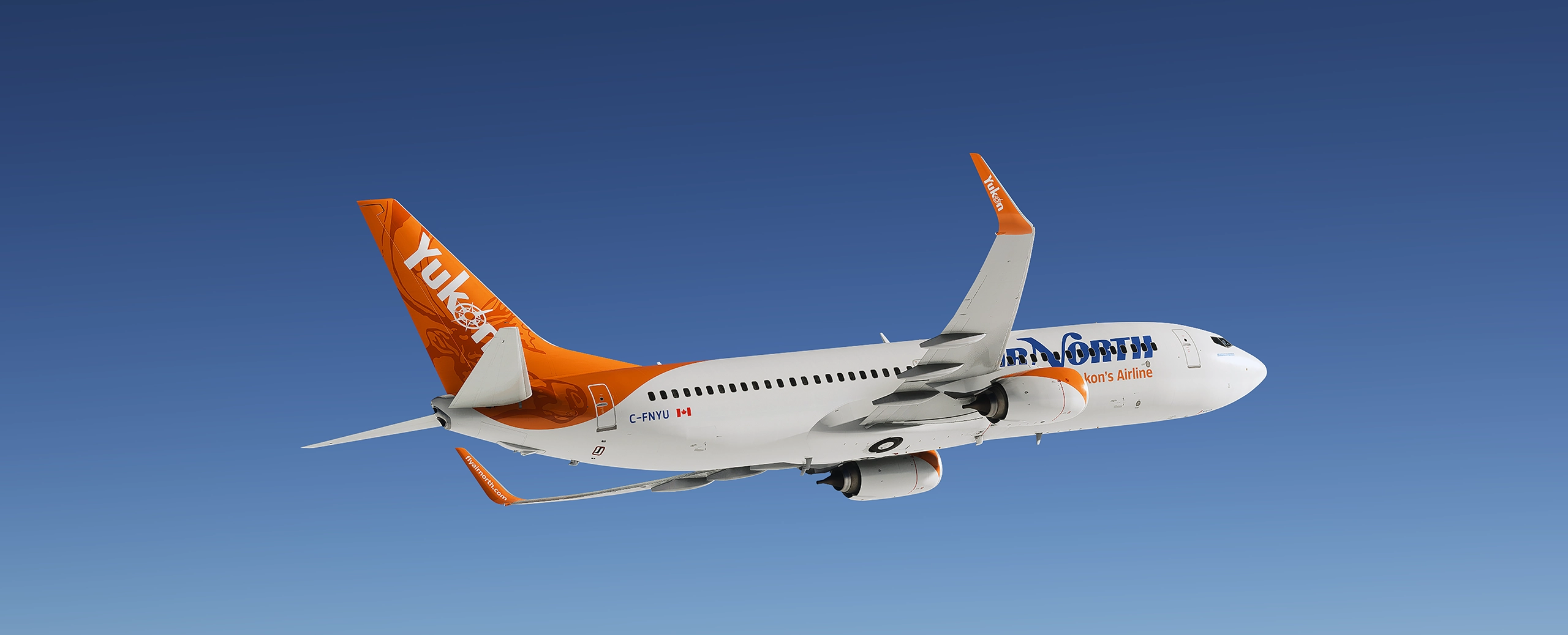 737-800 flying in a blue sky, bottom angle view