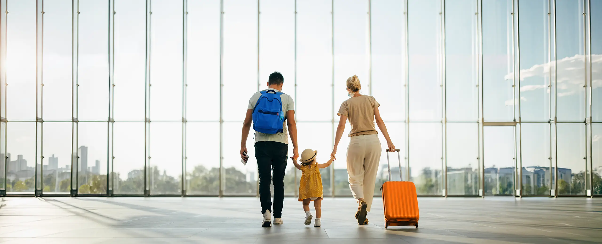 family at airport flying air north