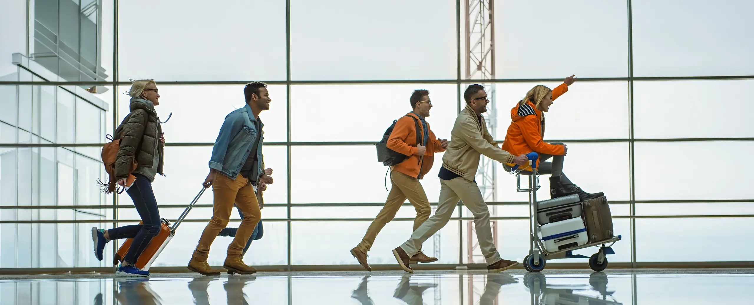 group travelling at airport heading on their next adventure